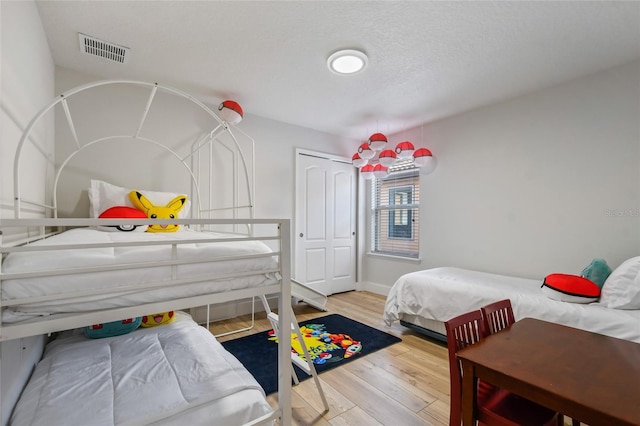 bedroom featuring hardwood / wood-style flooring