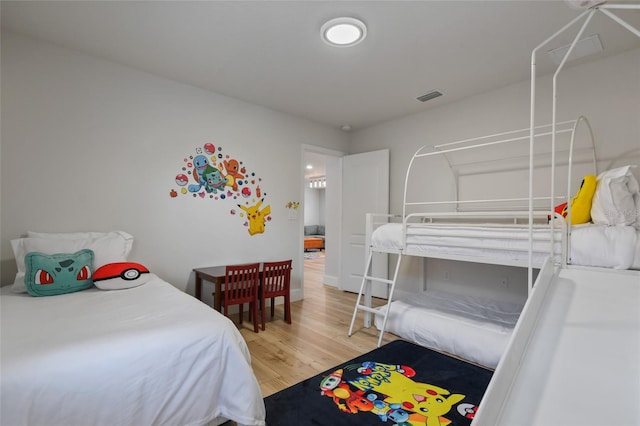 bedroom with wood-type flooring