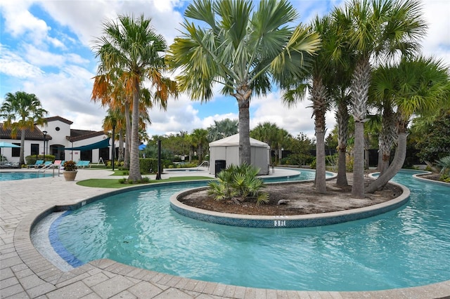 view of swimming pool featuring a patio