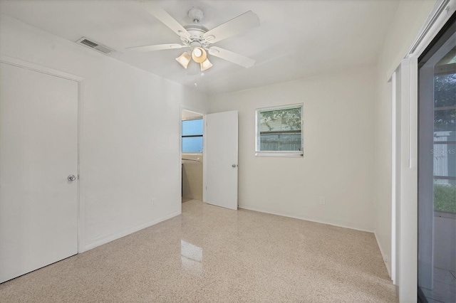 spare room featuring ceiling fan