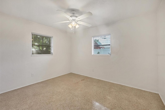 empty room featuring ceiling fan