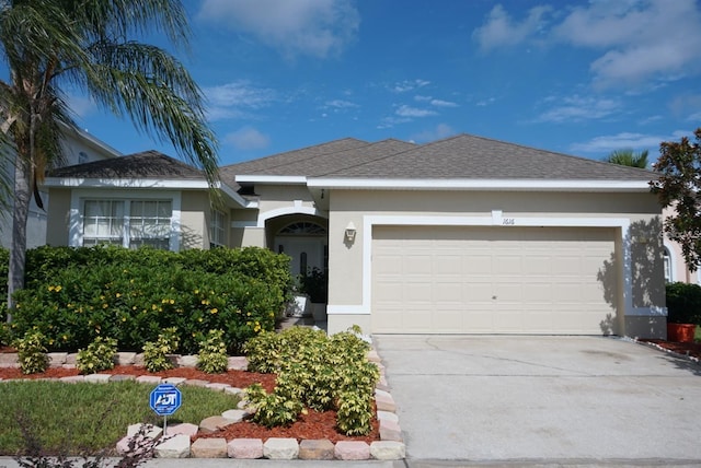 view of front of property with a garage