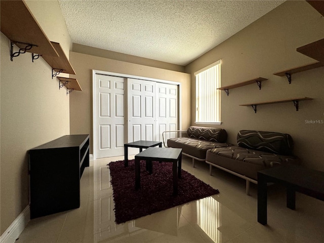 living room with a textured ceiling