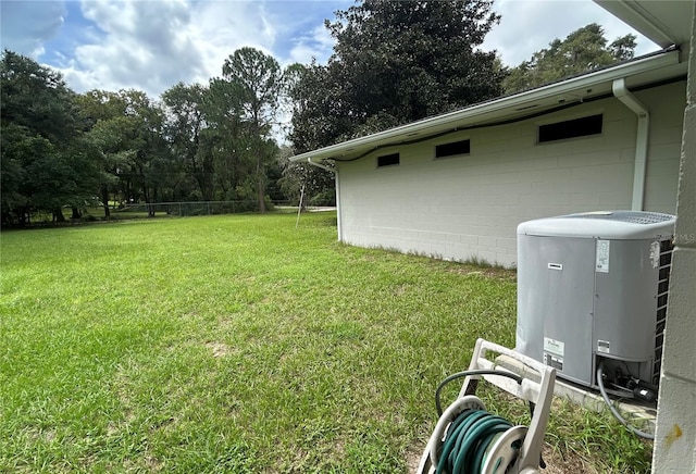 view of yard with central AC