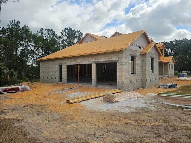 view of home's exterior featuring concrete block siding