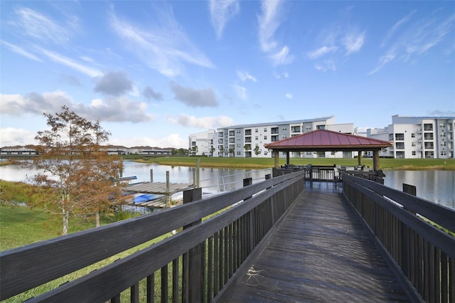 dock area featuring a gazebo and a water view