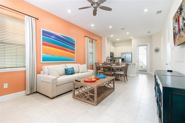 living room with ceiling fan