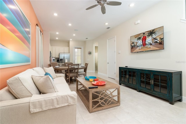 living room with ceiling fan