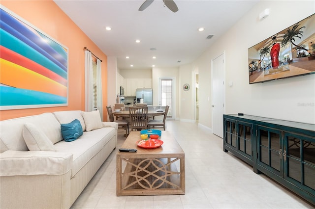 living room with ceiling fan