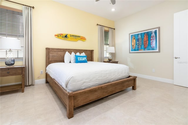 bedroom featuring ceiling fan and light tile patterned floors