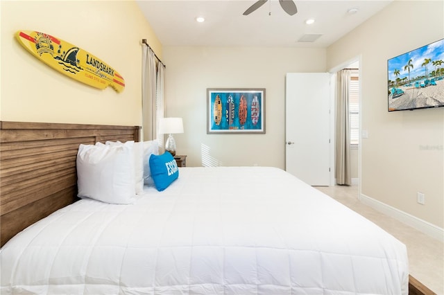 bedroom with ceiling fan and light colored carpet