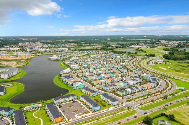 bird's eye view with a water view