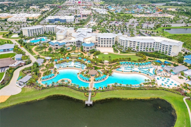 birds eye view of property featuring a water view