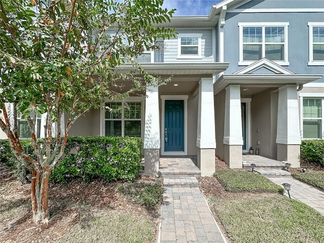 entrance to property with covered porch