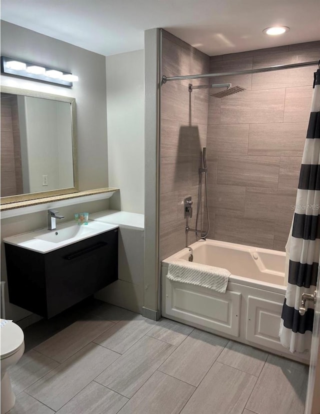 13427 Blue Heron Beach Dr Unit 501, Orlando, FL 32821 - full bathroom featuring shower / tub combo, toilet, wood tiled floors, vanity, and recessed lighting