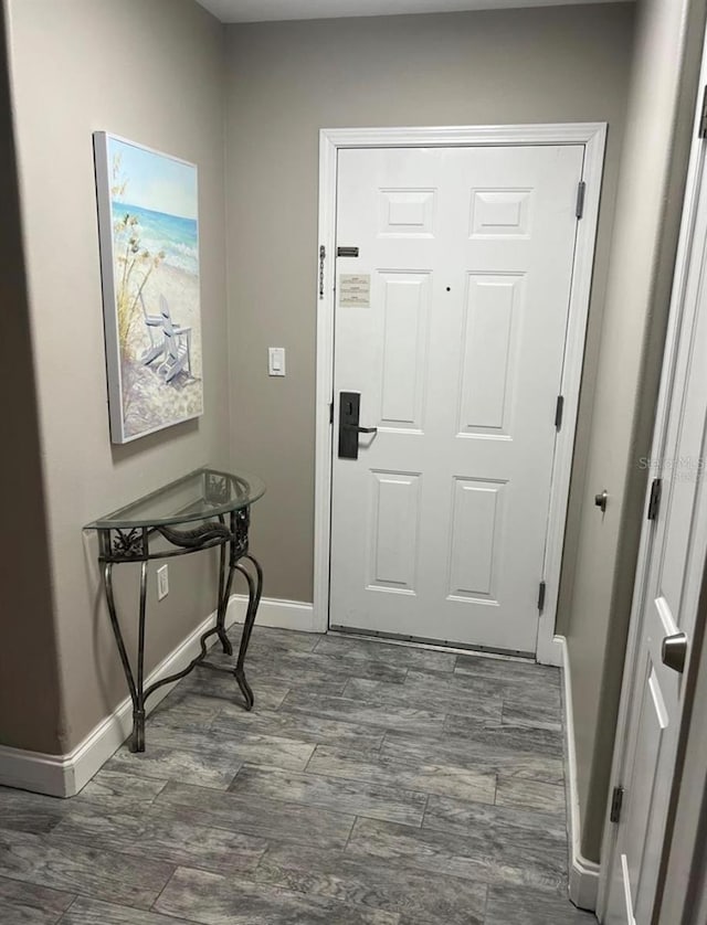 entryway featuring dark hardwood / wood-style floors