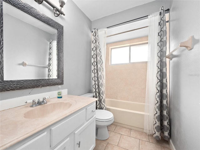 full bathroom featuring vanity, shower / tub combo, toilet, and tile patterned flooring