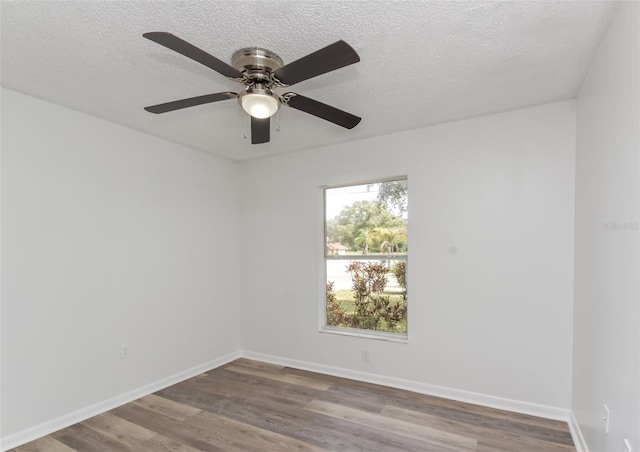 unfurnished room with wood-type flooring, ceiling fan, and a textured ceiling