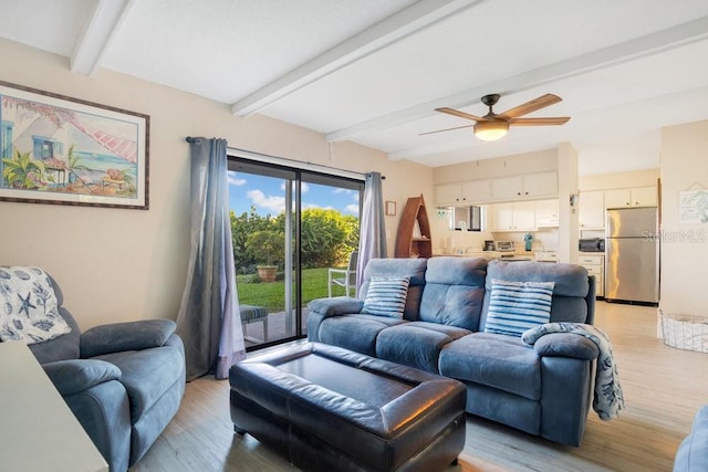 living room featuring beam ceiling, ceiling fan, and light hardwood / wood-style flooring