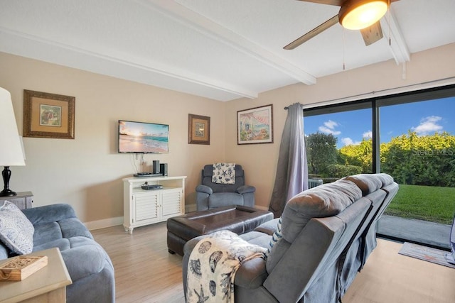 3150 N Atlantic Ave Unit 3-550, Cocoa Beach, FL 32931 - living room featuring beamed ceiling, light wood finished floors, a ceiling fan, and baseboards