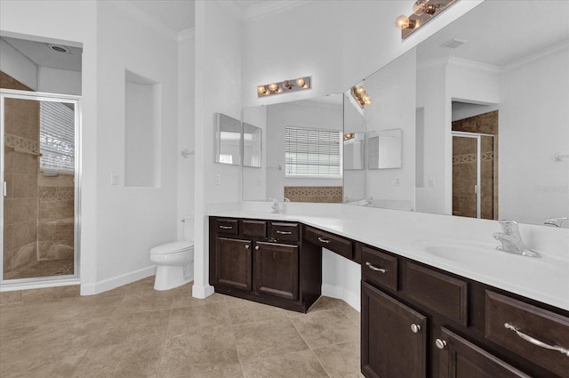 bathroom with vanity, ornamental molding, an enclosed shower, tile patterned floors, and toilet