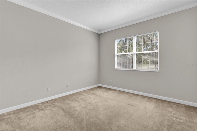 unfurnished room with a textured ceiling, crown molding, and light colored carpet