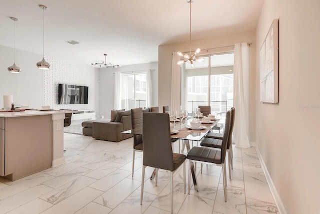 dining room with a chandelier