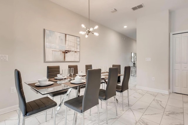 dining space featuring a notable chandelier