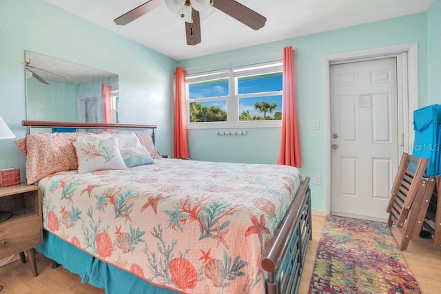 bedroom featuring ceiling fan and light hardwood / wood-style flooring