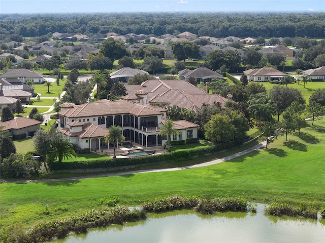 birds eye view of property featuring a water view