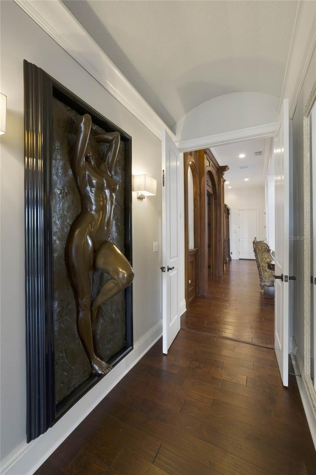 hall with dark hardwood / wood-style flooring