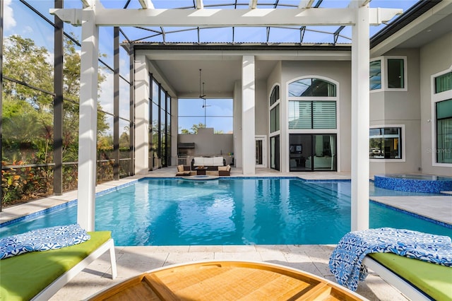 view of pool with a patio, an outdoor living space, and glass enclosure