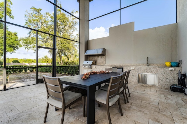 sunroom featuring a wealth of natural light