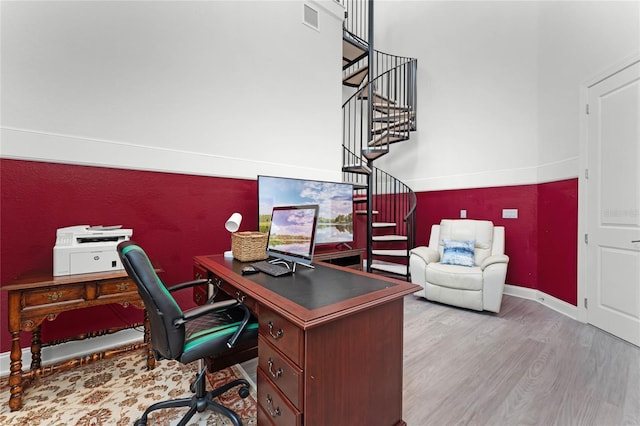 office area with light wood-type flooring