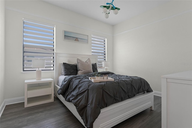 bedroom featuring dark wood-type flooring