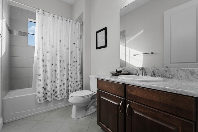 full bathroom with vanity, toilet, tile patterned floors, and shower / bath combo with shower curtain