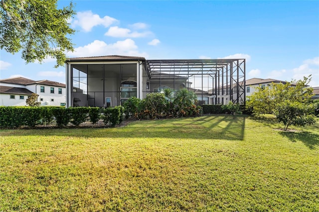 view of yard with a lanai