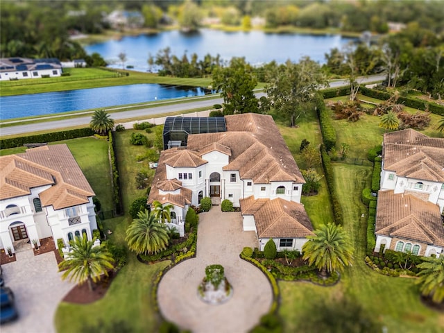 drone / aerial view with a water view