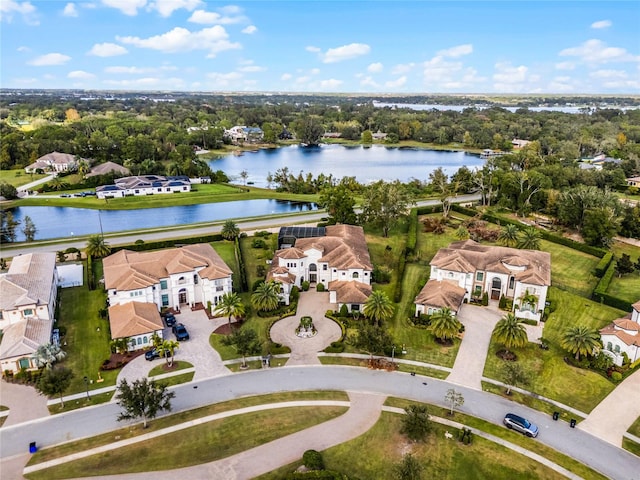 birds eye view of property featuring a water view