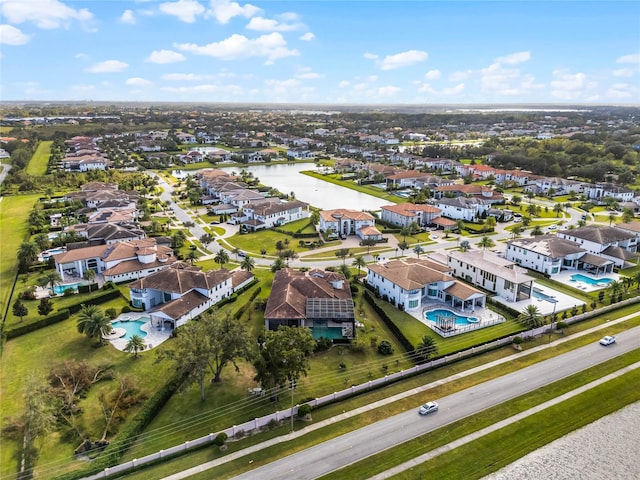 drone / aerial view with a water view