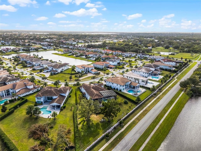 drone / aerial view with a water view