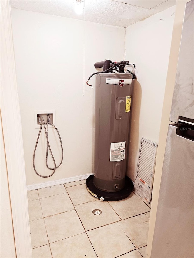 1916 Lake Atriums Cir Unit 25, Orlando, FL 32839 - utility room with electric water heater