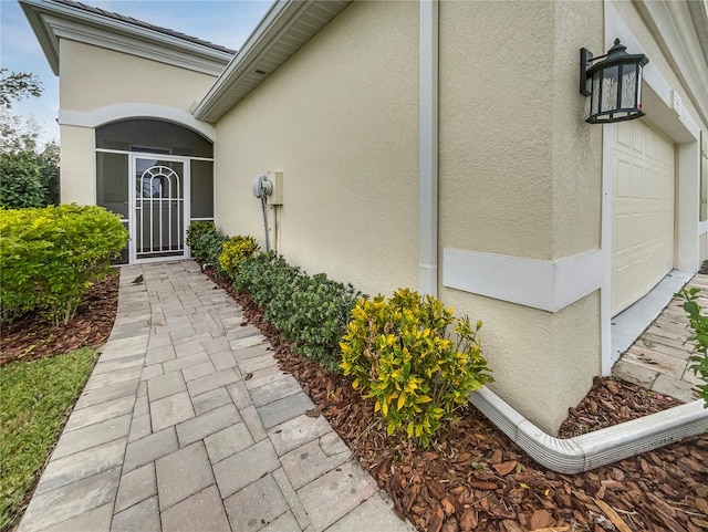 property entrance featuring a garage