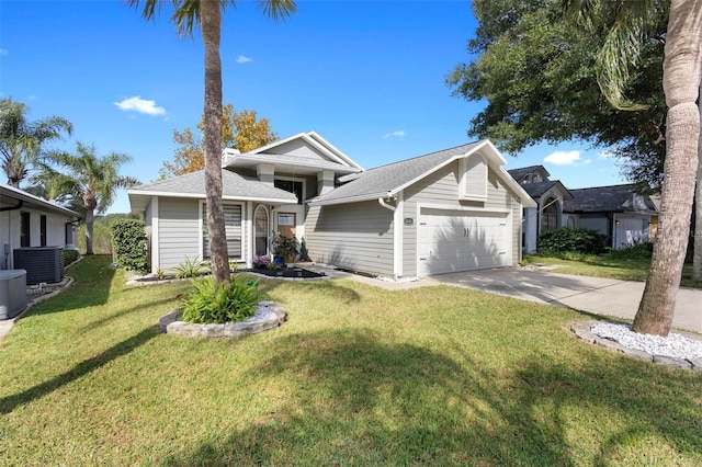 view of front facade with cooling unit, a garage, and a front lawn