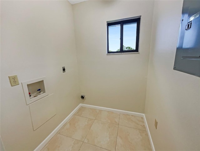 laundry area featuring hookup for a washing machine, light tile patterned floors, and electric dryer hookup