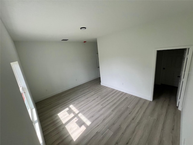 2572 SW 159th Ln, Ocala, FL 34473 - spare room with light wood-type flooring and baseboards