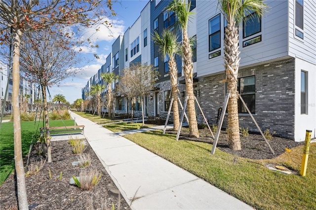 view of community with a lawn