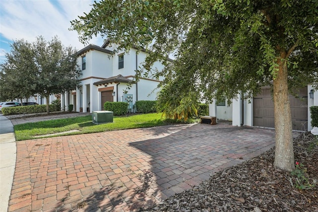 view of patio / terrace featuring a garage