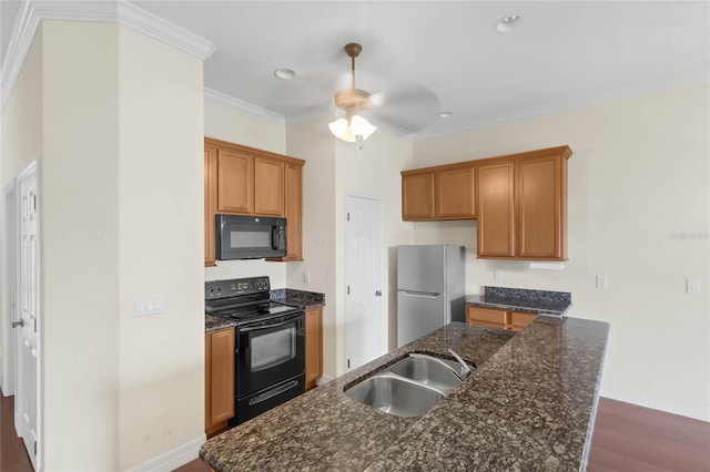 kitchen featuring black appliances, ceiling fan, ornamental molding, dark hardwood / wood-style floors, and sink