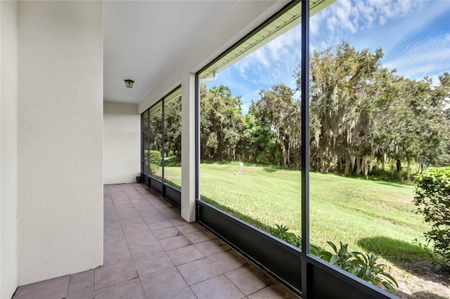 unfurnished sunroom featuring a healthy amount of sunlight